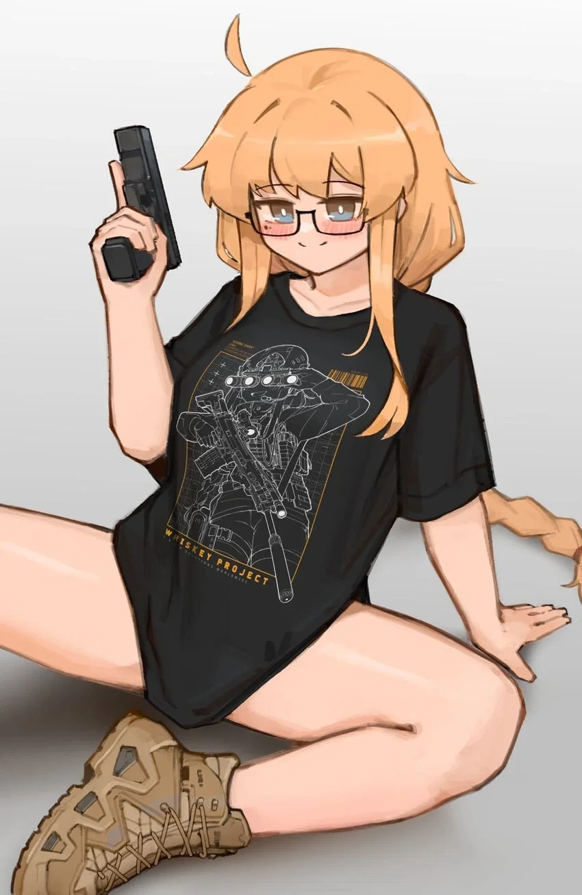 Whiskey wearing an oversized black shirt with a tac-girl decal on it