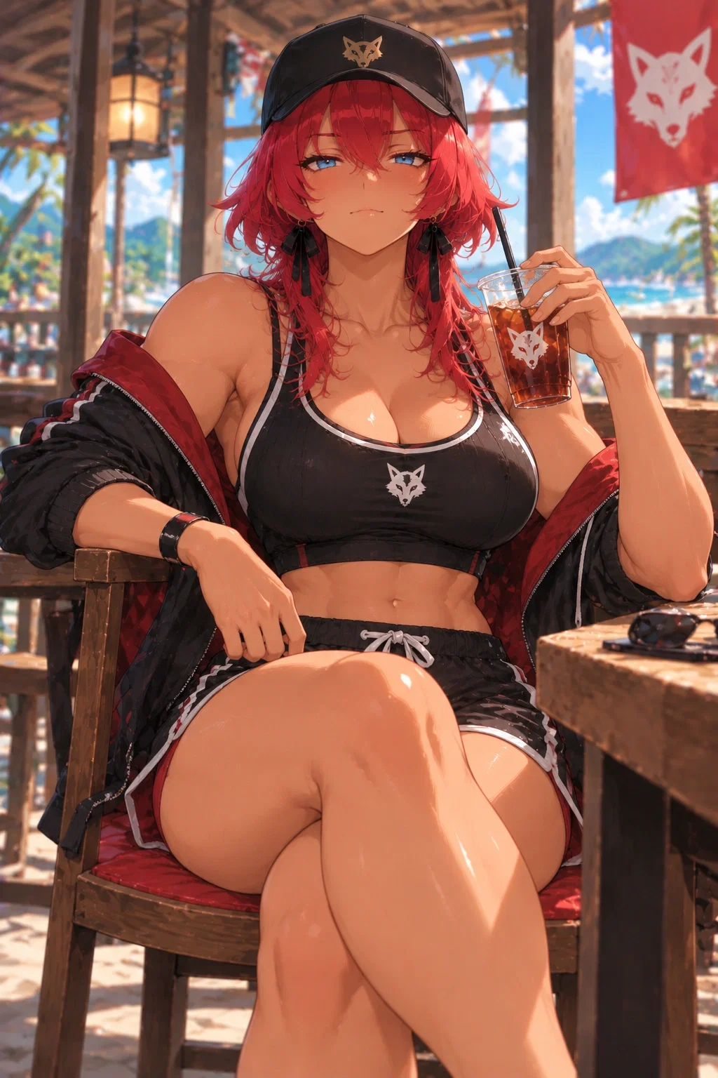 Rory seated beside the gym in a black sports top and red shorts with an iced drink