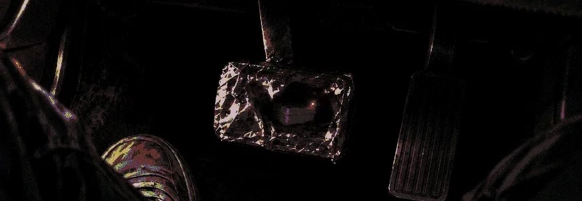 A photo of the foil-wrapped brake, displaying Cole's bomb under the seat.