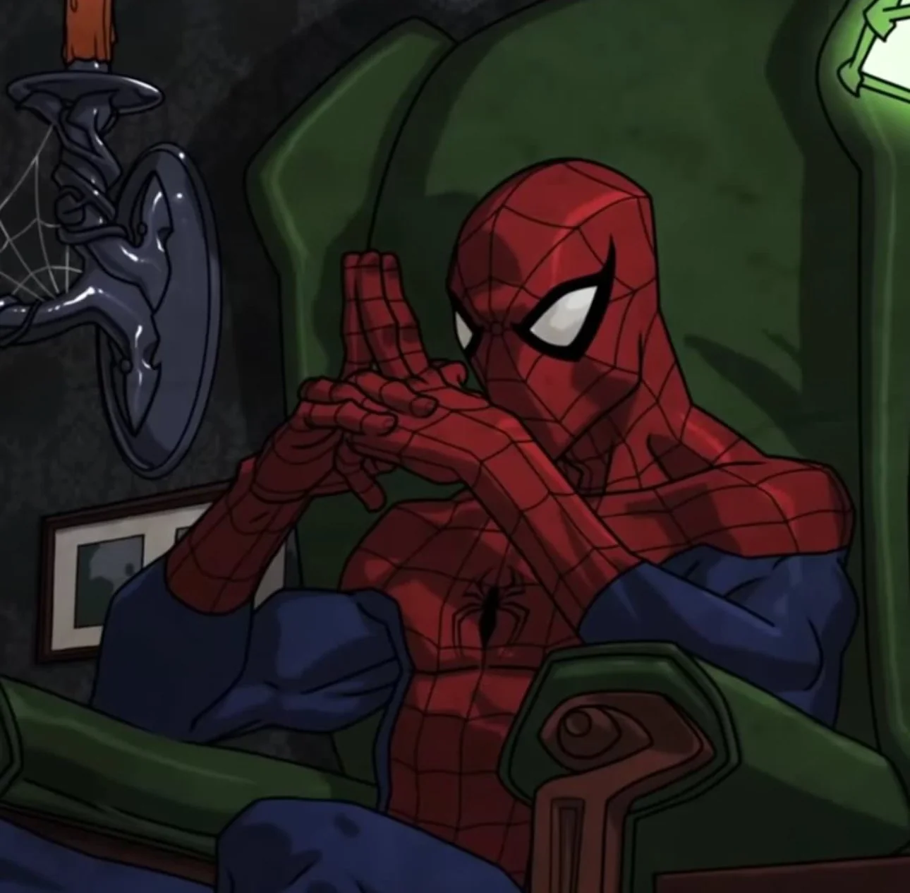 Spider-Man sitting on a chair contemplating