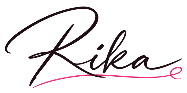 Rika's handwritten signature with a pink thread flourish